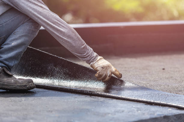 Professional Basement Waterproofing technician working in Albertson, NY